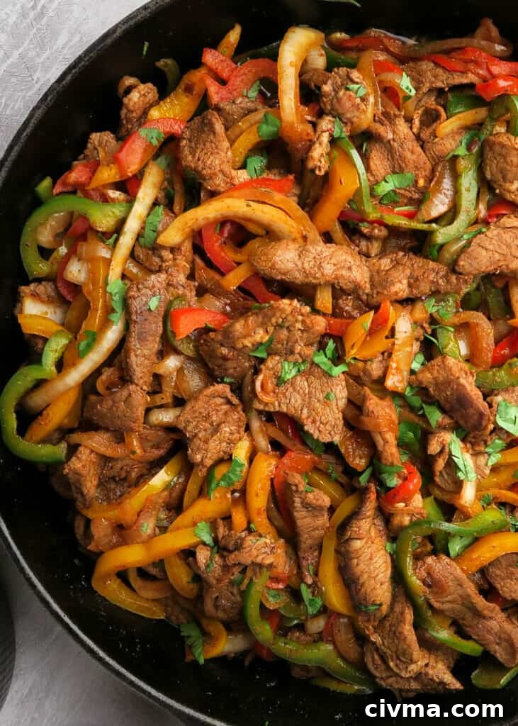 Steak fajitas with bell peppers and onions