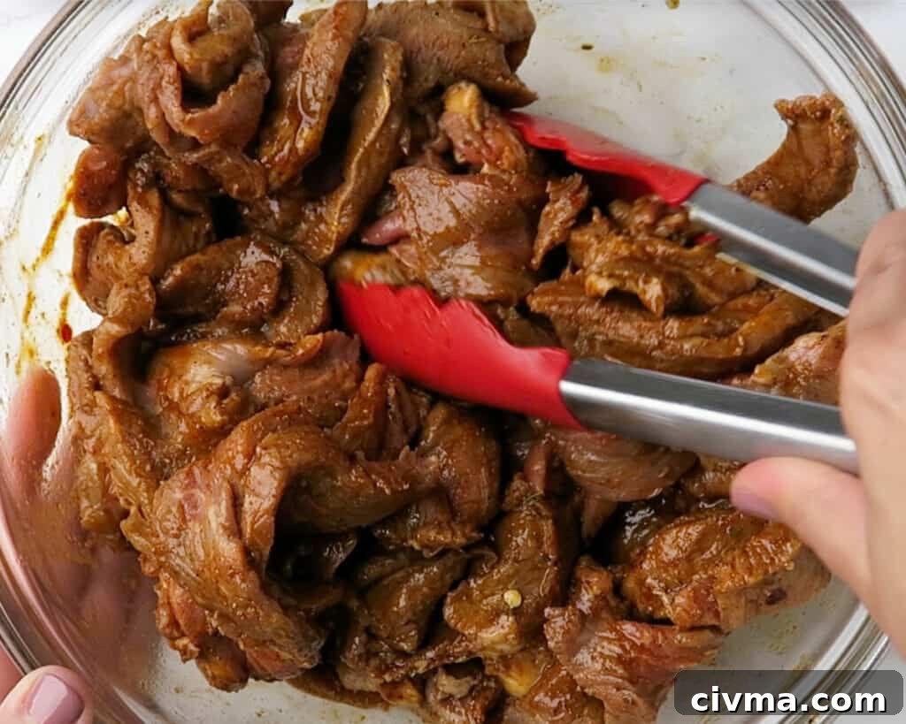 Steak strips in a lime and spice marinade for fajitas