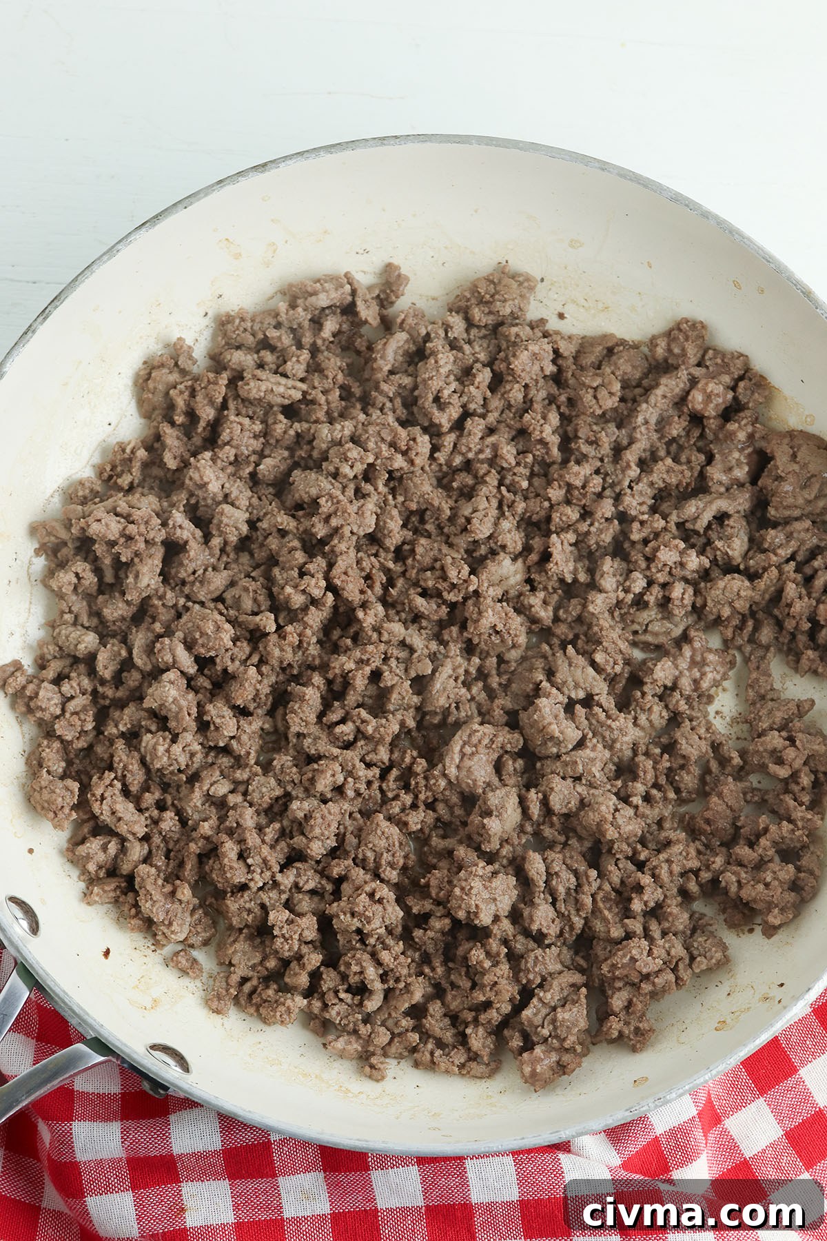 Dorito Taco Salad Recipe with Ground Beef and Catalina Dressing 4 Browned ground beef in a skillet.