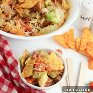 Dorito Taco Salad Recipe with Ground Beef and Catalina Dressing 9 Dorito Taco Salad in white bowl.