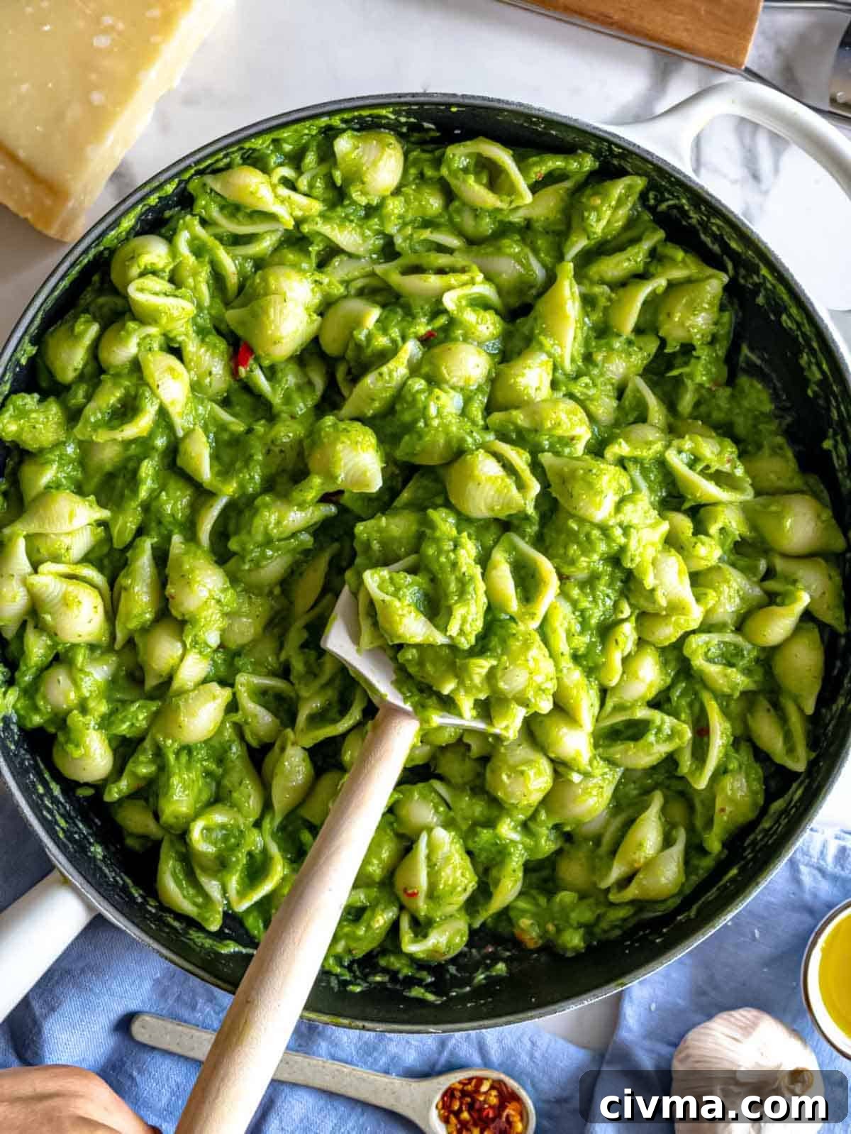 Broccoli pasta in a skillet.
