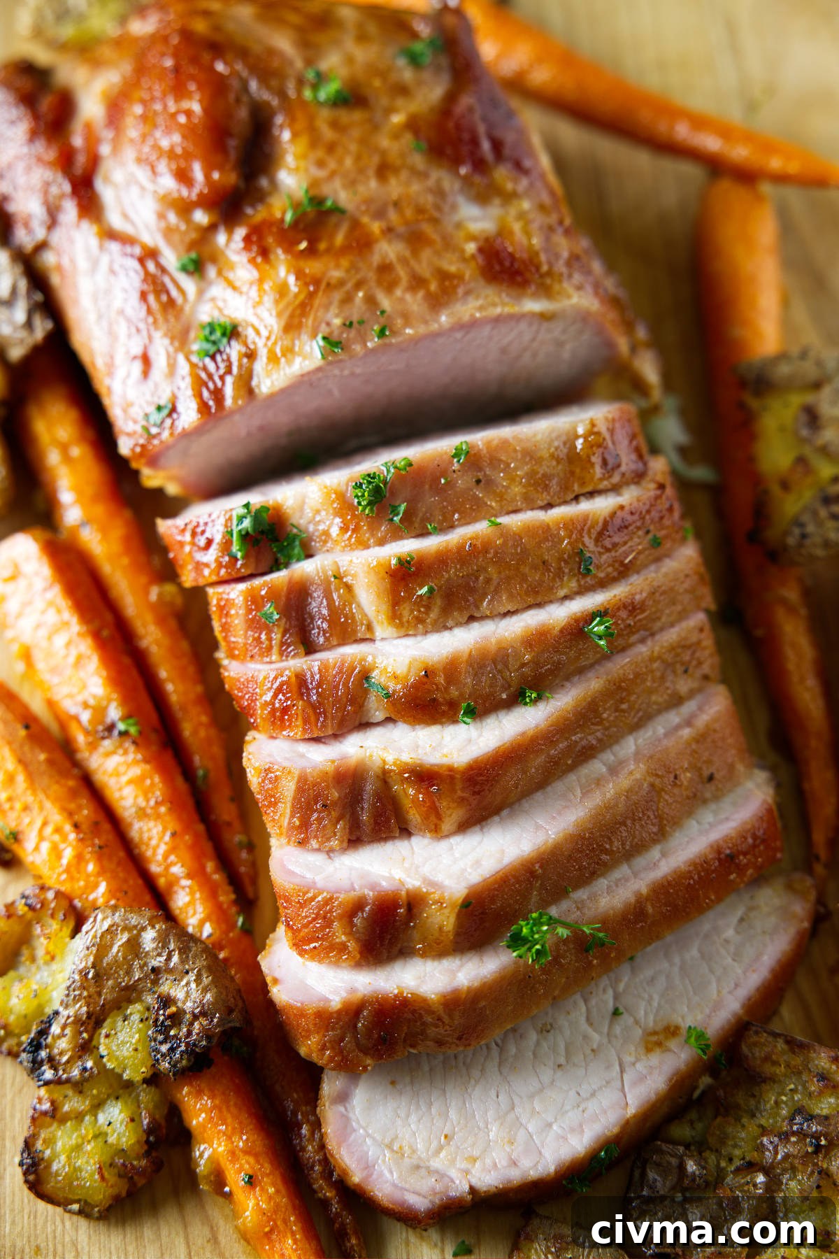 Pork Loin Smoking Time Per Pound and Temperature 2 sliced whole smoked pork loin on cutting board