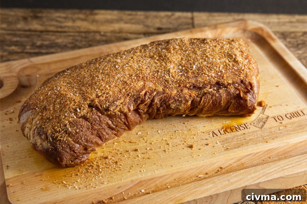 Pork Loin Smoking Time Per Pound and Temperature 6 Putting dry rub on pork loin.
