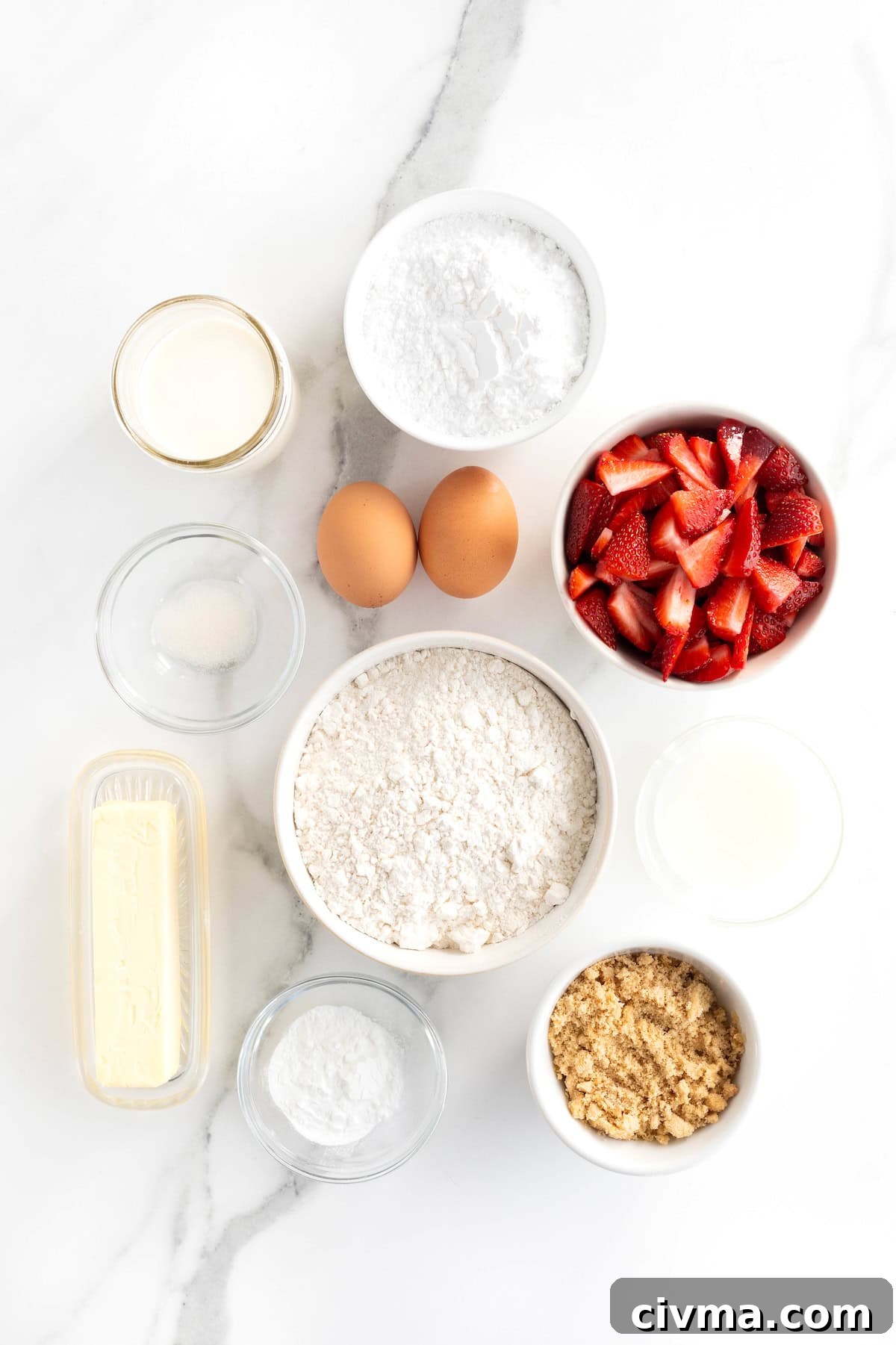 Ingredients for strawberry streusel scones arranged in small dishes.