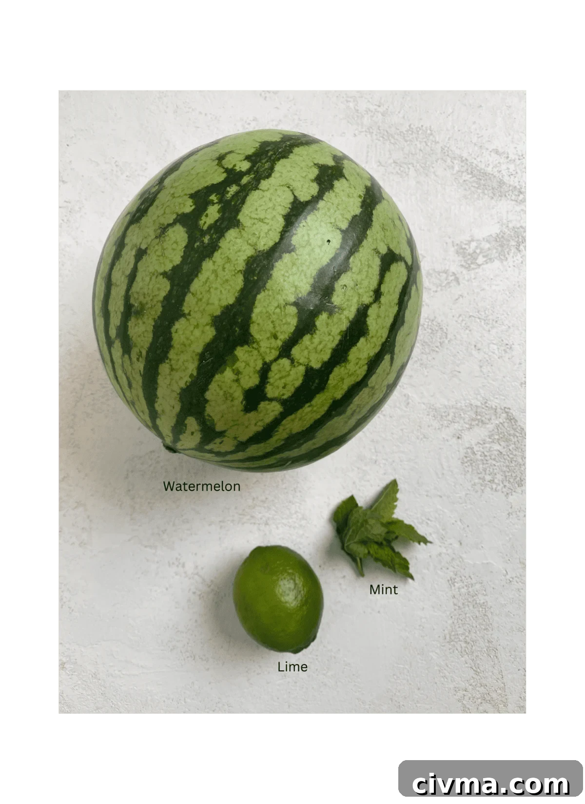 Homemade Watermelon Popsicles Recipe 3 ingredients of watermelon, lime and mint on a white surface
