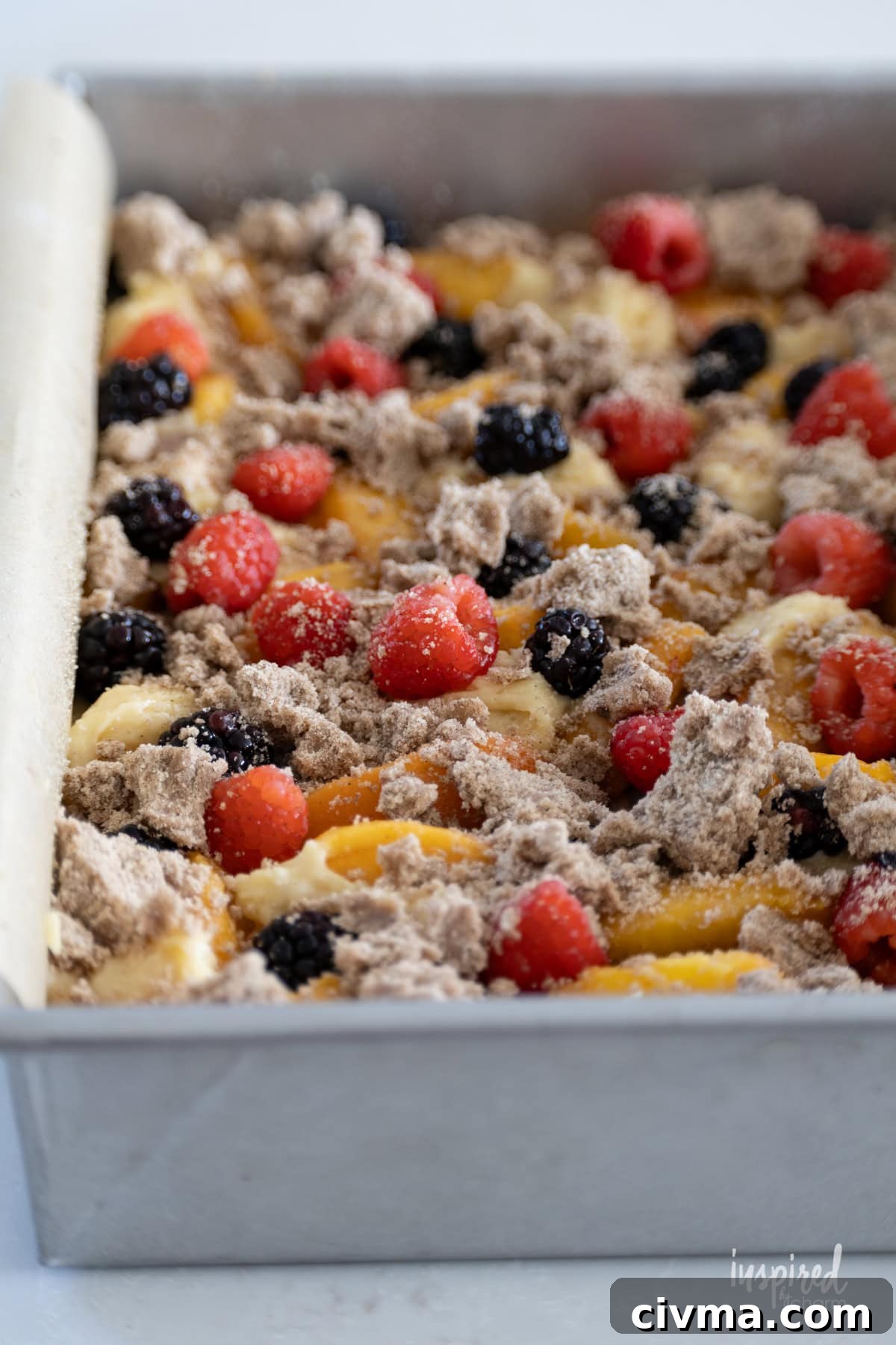 crumb topping on unbaked Nectarine and Berry Buckle.