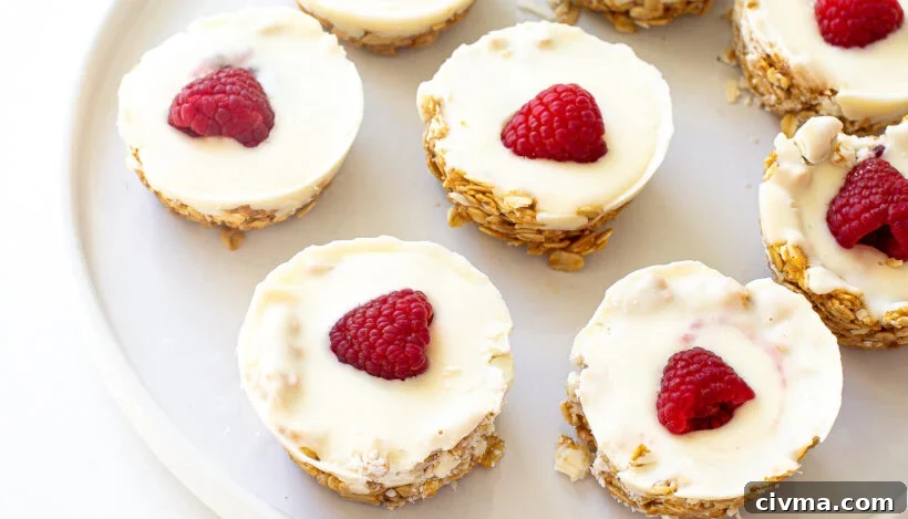 White chocolate oat cups served on a white plate.