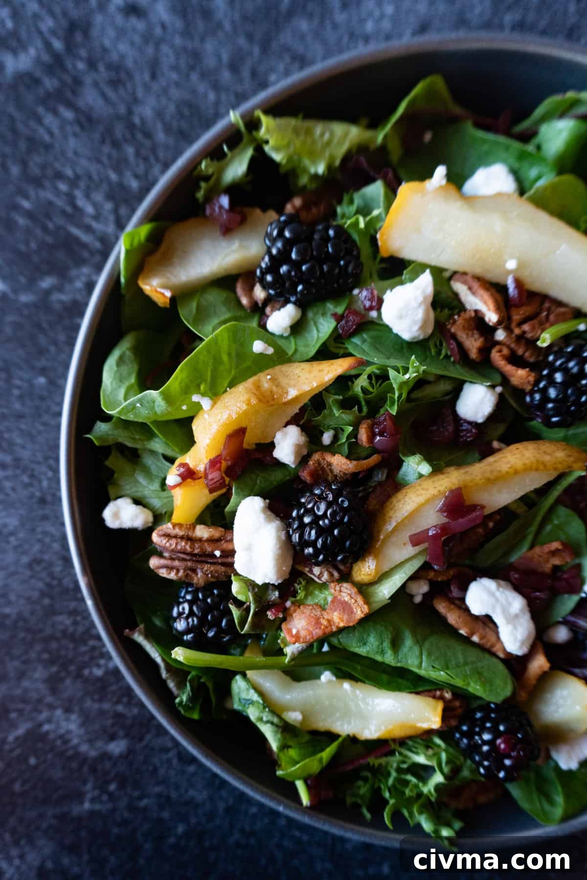 Salad in bowl with all the toppings on 