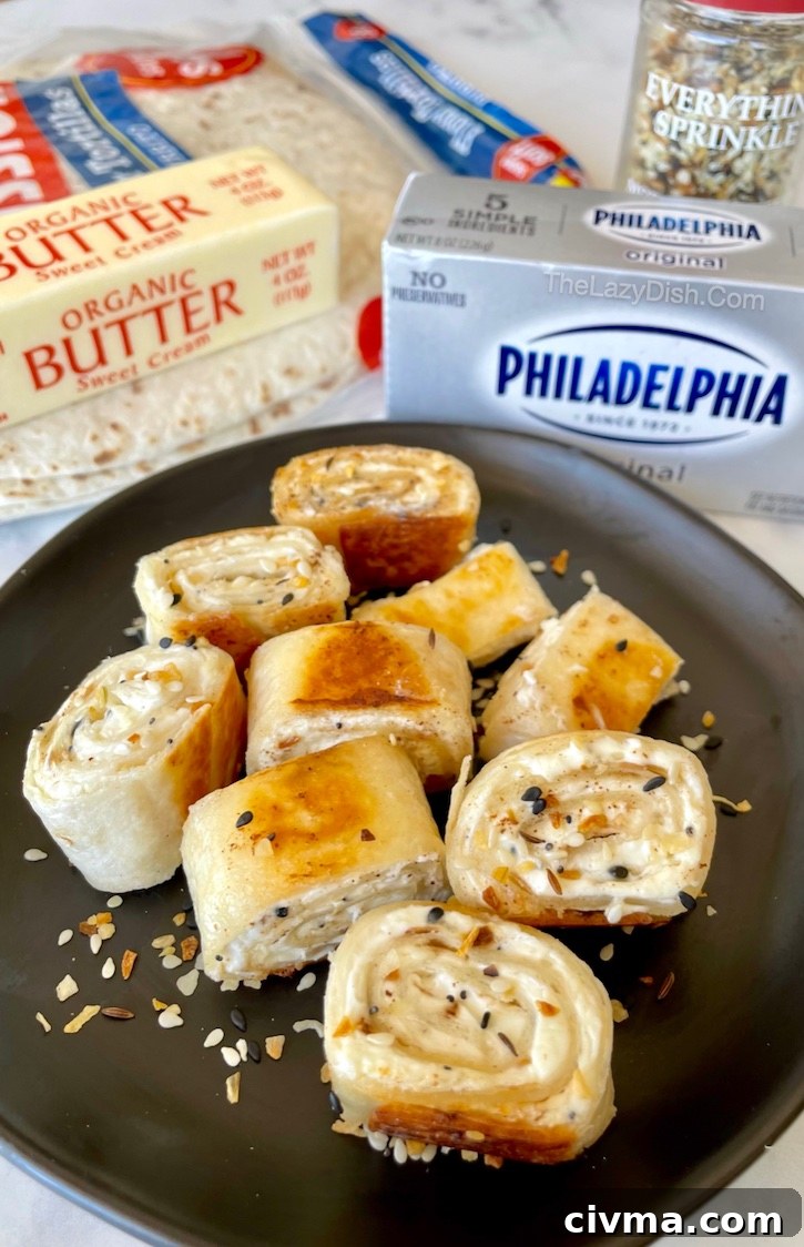 Crispy Bagel Bite Pinwheels are a super fun and easy snack idea! They are quick to make and totally addicting. My picky kids love them! 