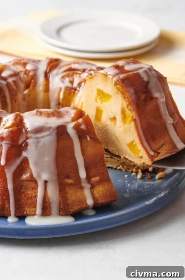 Peach cobbler pound cake with a slice missing.