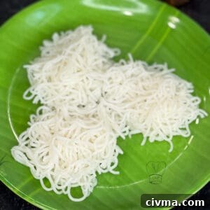 Steamed idiyappam served on a plate.