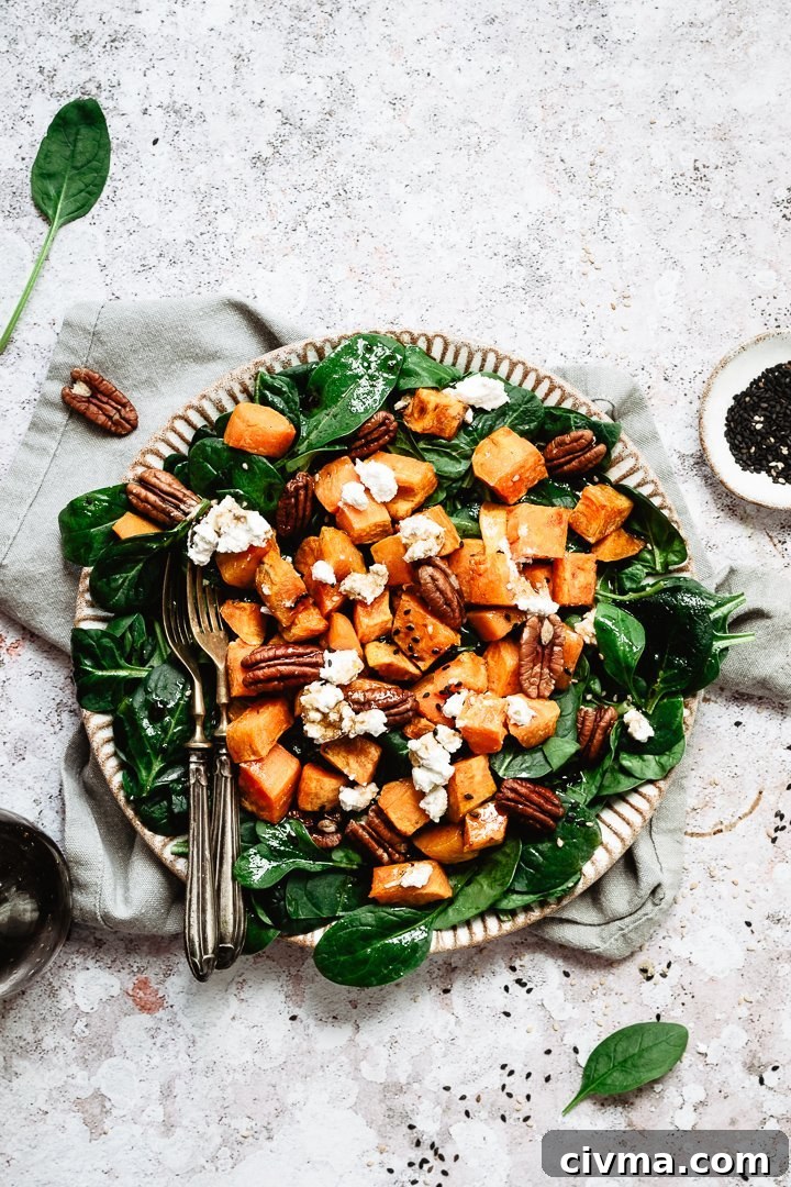 Spinach sweet potato pecan salad with goat cheese