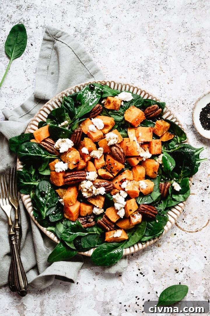 Fresh mixed salad with sweet potatoes, pecans and goat cheese