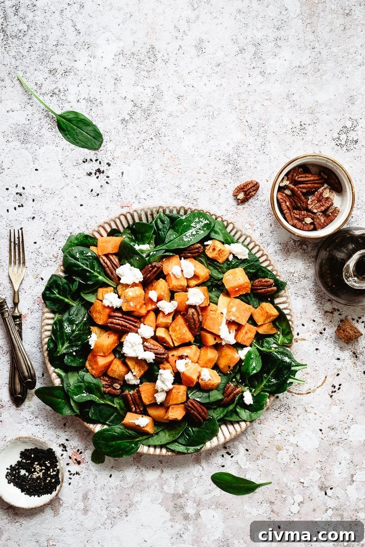 Baby spinach salad with roasted sweet potatoes