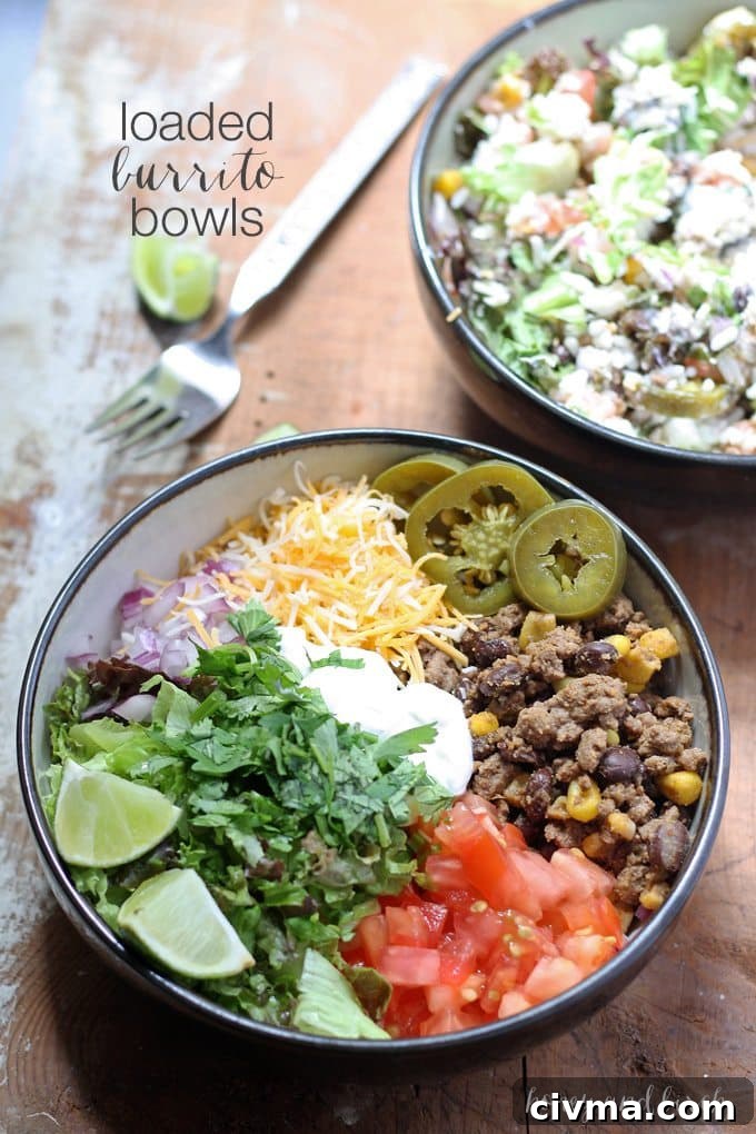 Loaded burrito bowls on a table ready to serve