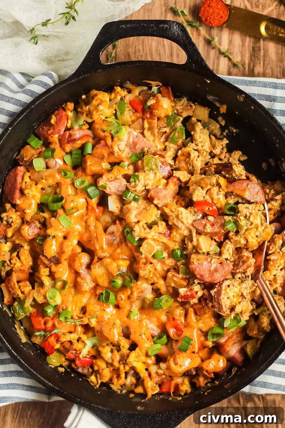 Overhead shot of a finished loaded Creole breakfast skillet.
