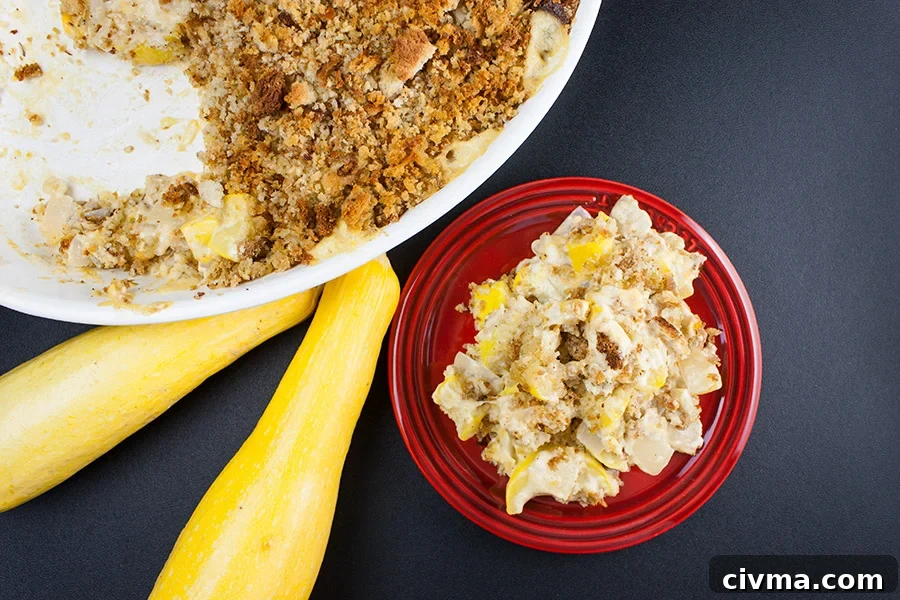 Southern Yellow Squash Casserole serving on a red plate