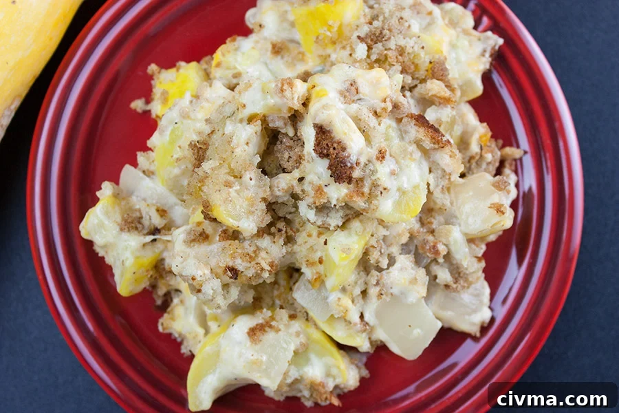 Southern Yellow Squash Casserole serving on a red plate