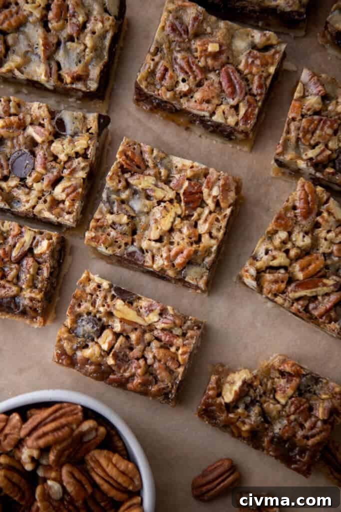 multiple squares of chocolate pecan pie bars