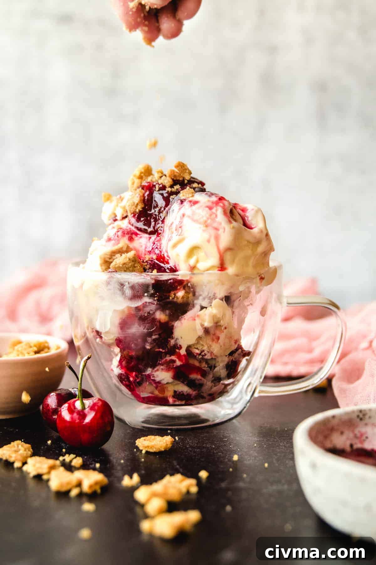 The crunchy graham cracker crumble adds a nice crunch to this bourbon cherry cheesecake ice cream sundae.