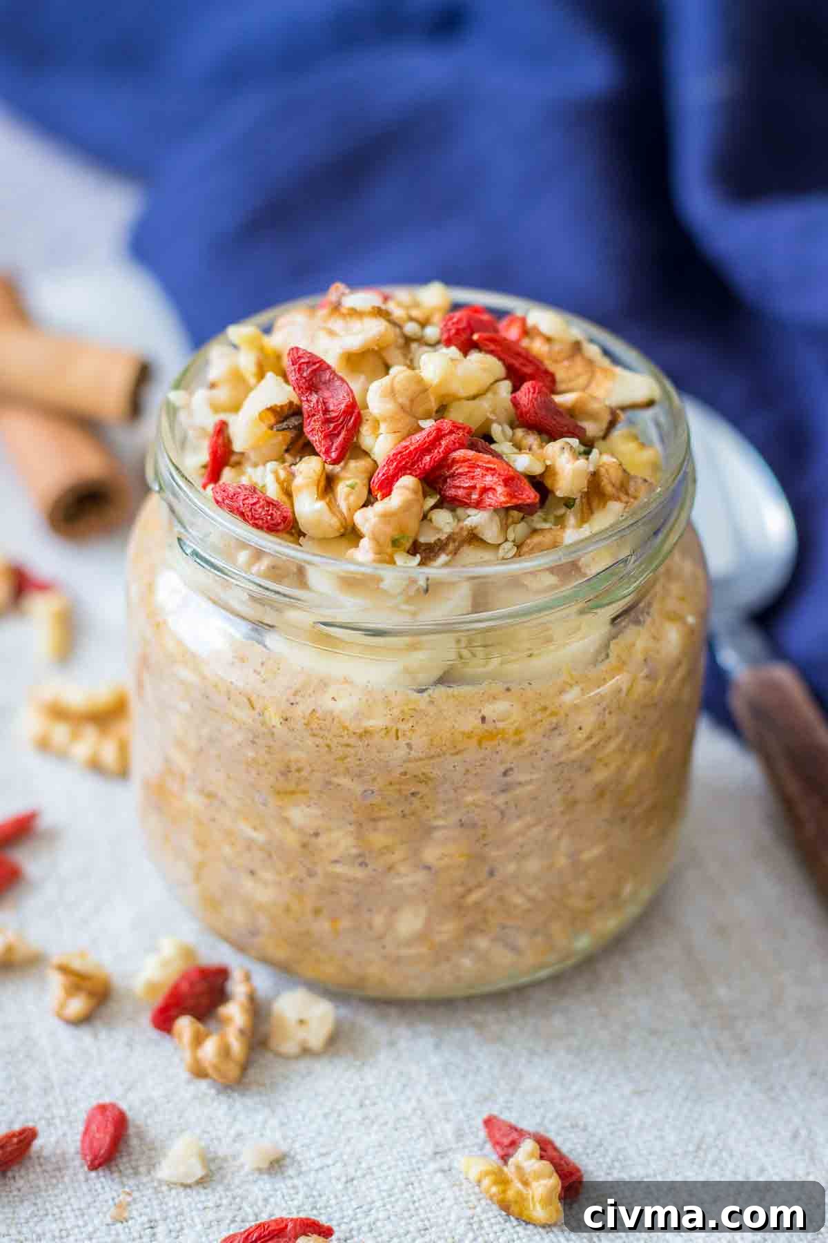 Pumpkin Overnight Oats topped with walnuts and goji berries