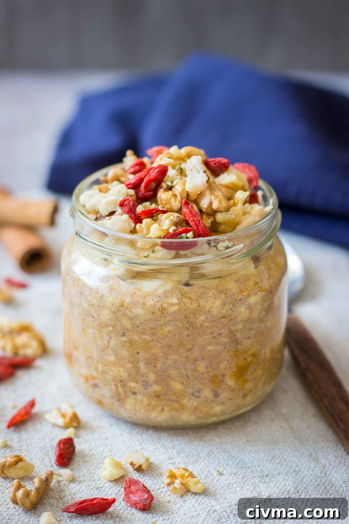 Pumpkin Overnight Oats topped with walnuts and goji berries