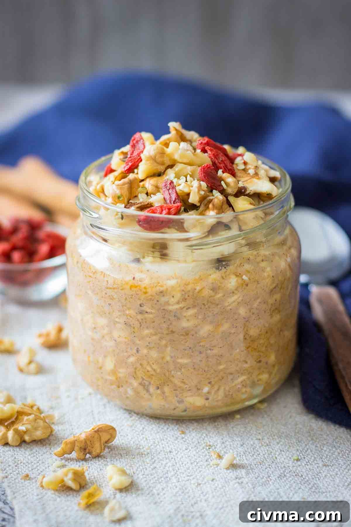 Pumpkin Overnight Oats topped with walnuts and goji berries
