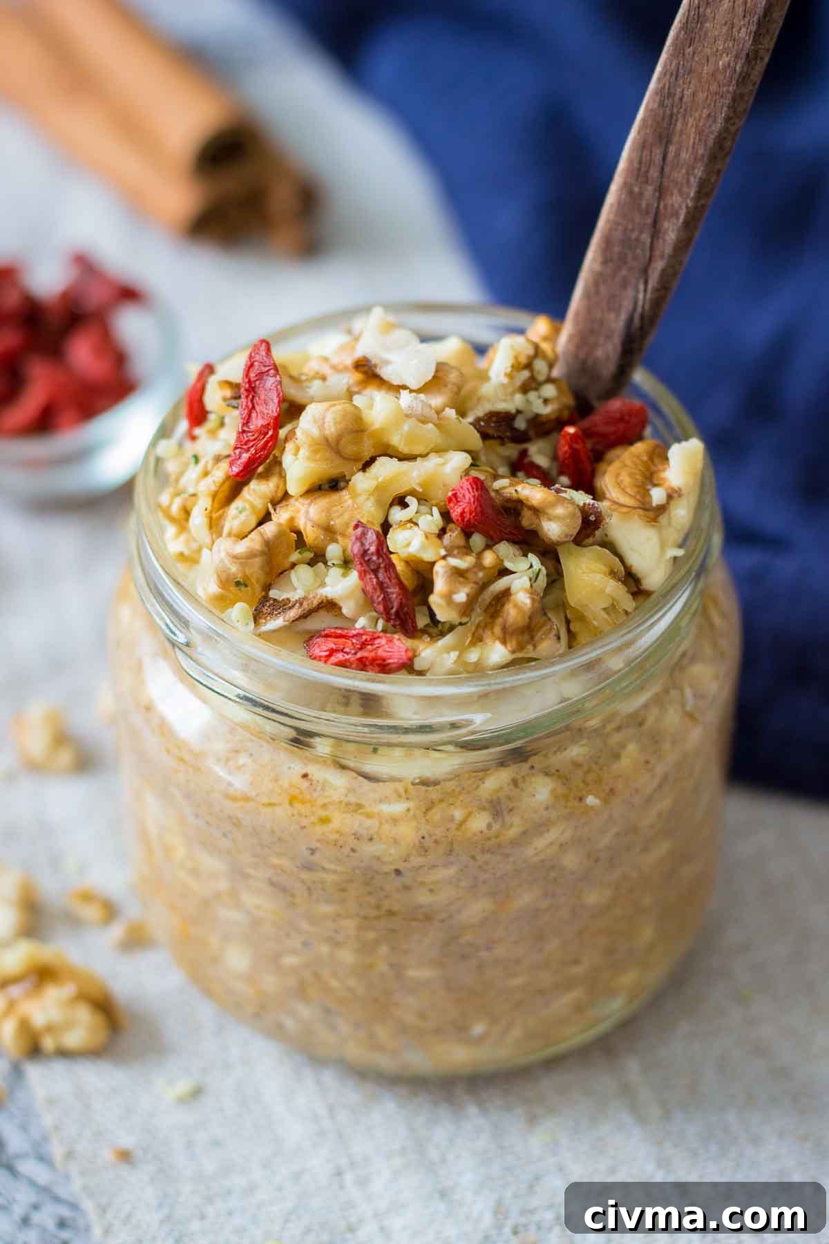 Pumpkin Overnight Oats topped with walnuts and goji berries