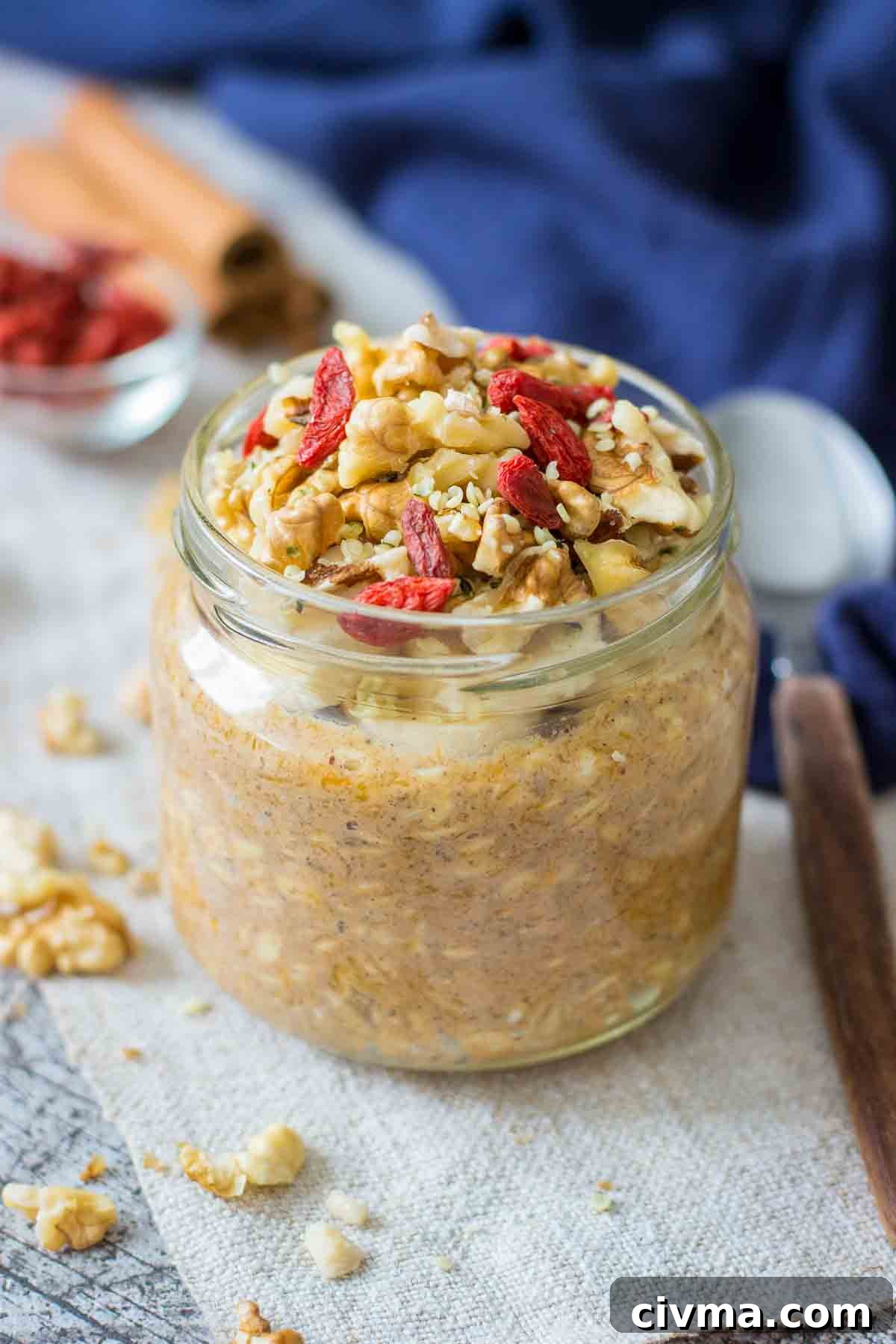 Pumpkin Overnight Oats topped with walnuts and goji berries