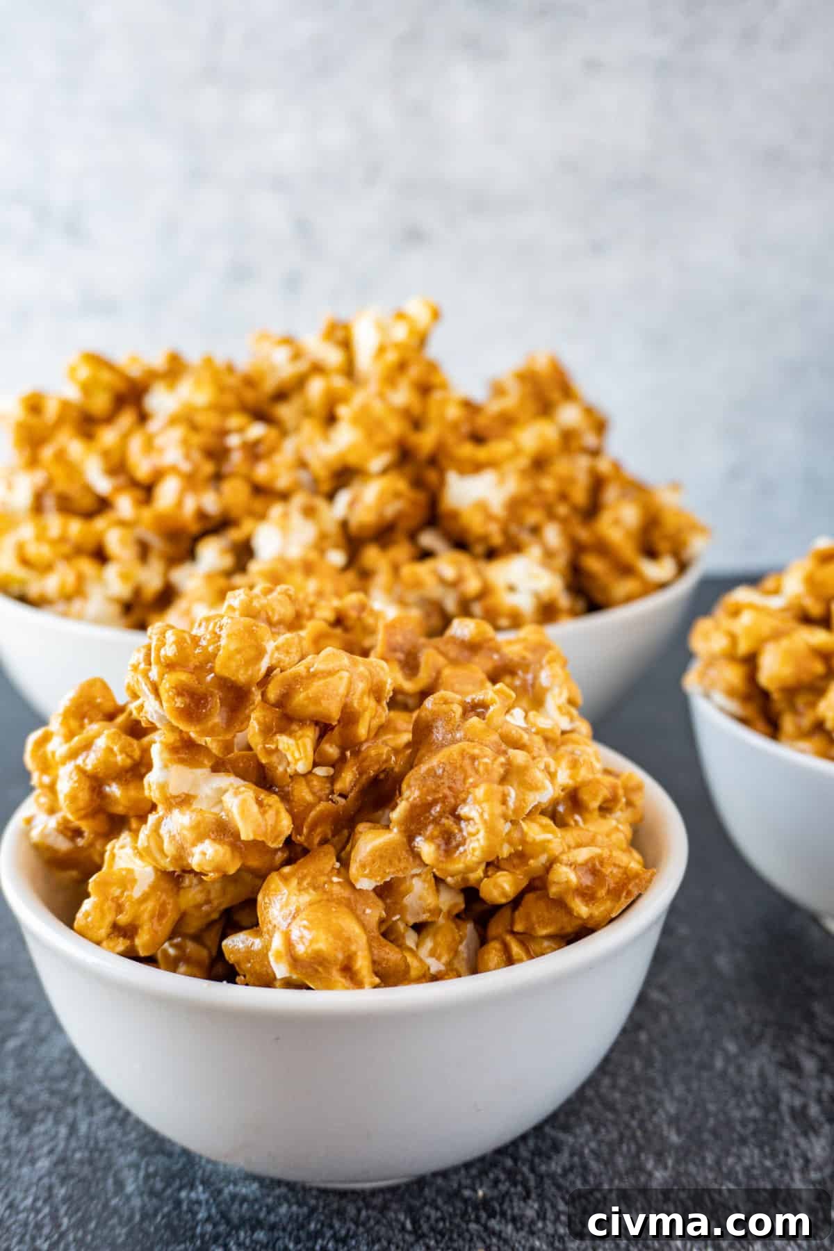 Homemade Caramel Popcorn Recipe 2 caramel popcorn in multiple bowls