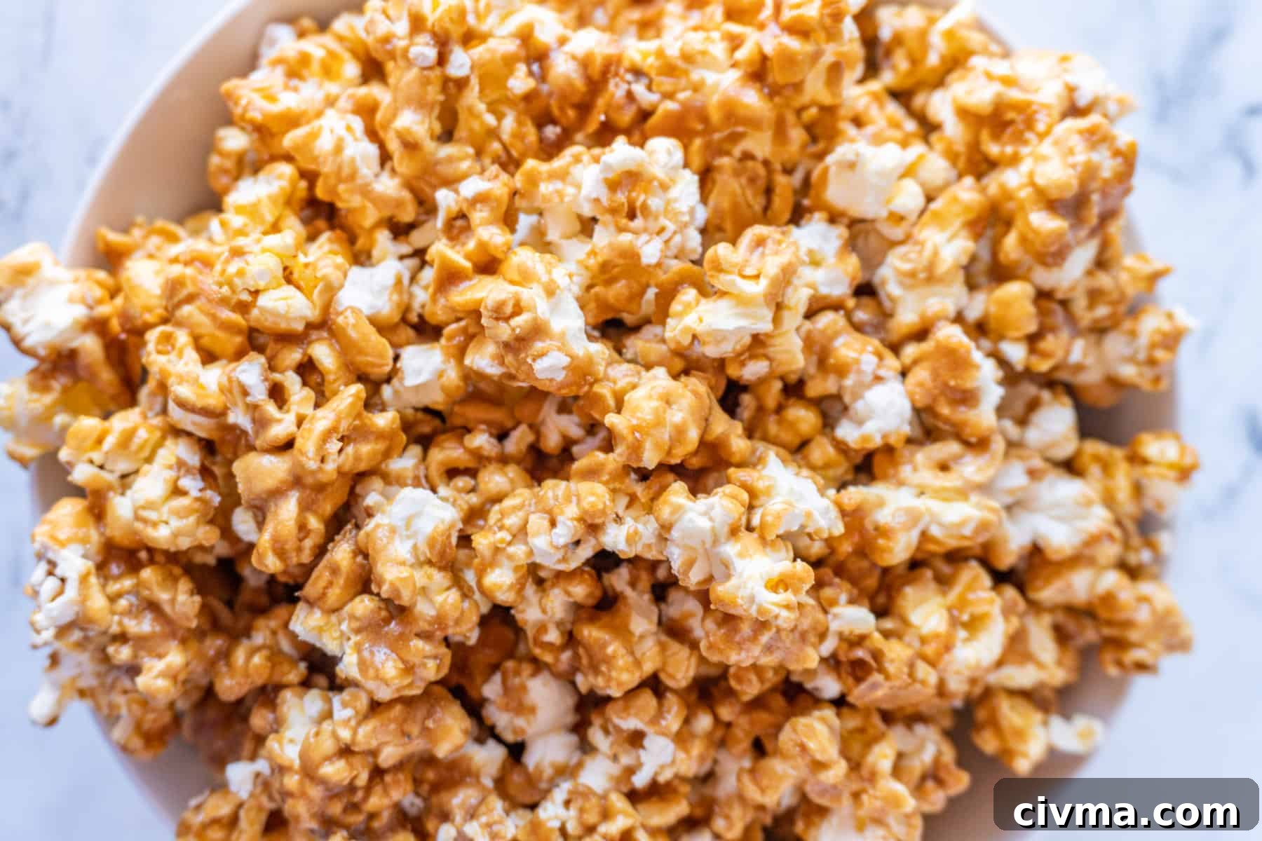 Homemade Caramel Popcorn Recipe 4 caramel popcorn in large bowl overhead shot