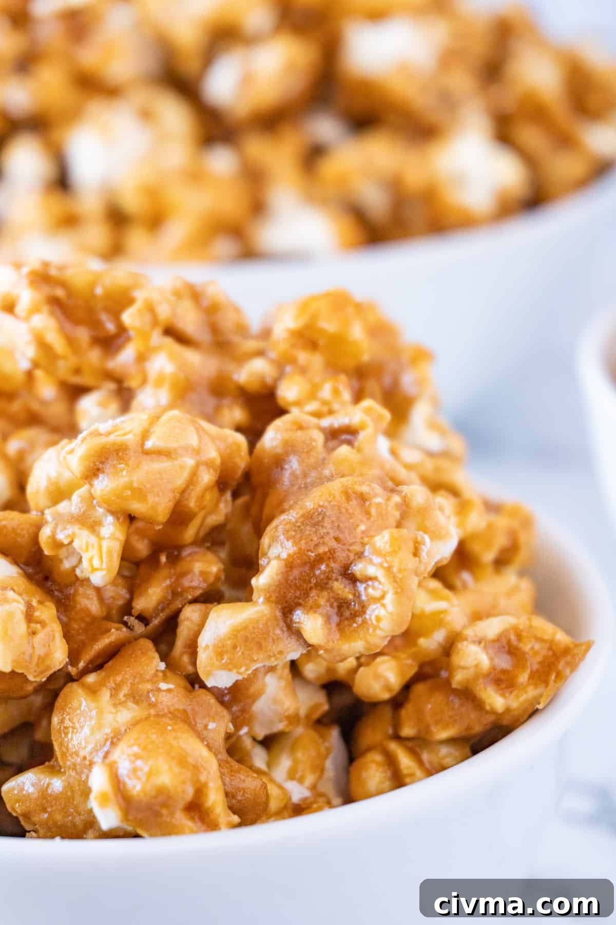 Homemade Caramel Popcorn Recipe 5 close up of caramel popcorn in bowl