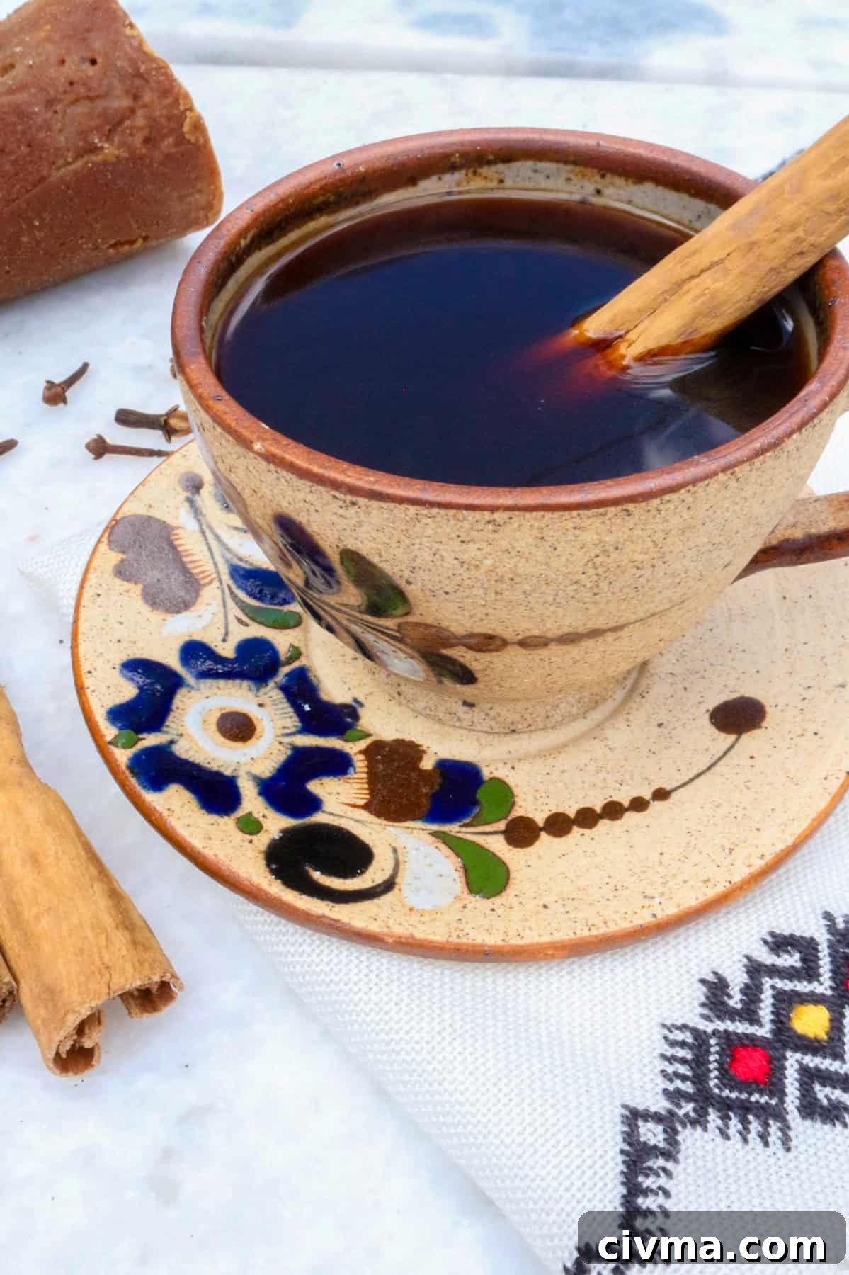 Authentic Mexican Café de Olla Recipe 2 Authentic Cafe de Olla Recipe, coffee in a mug with a cinnamon stick