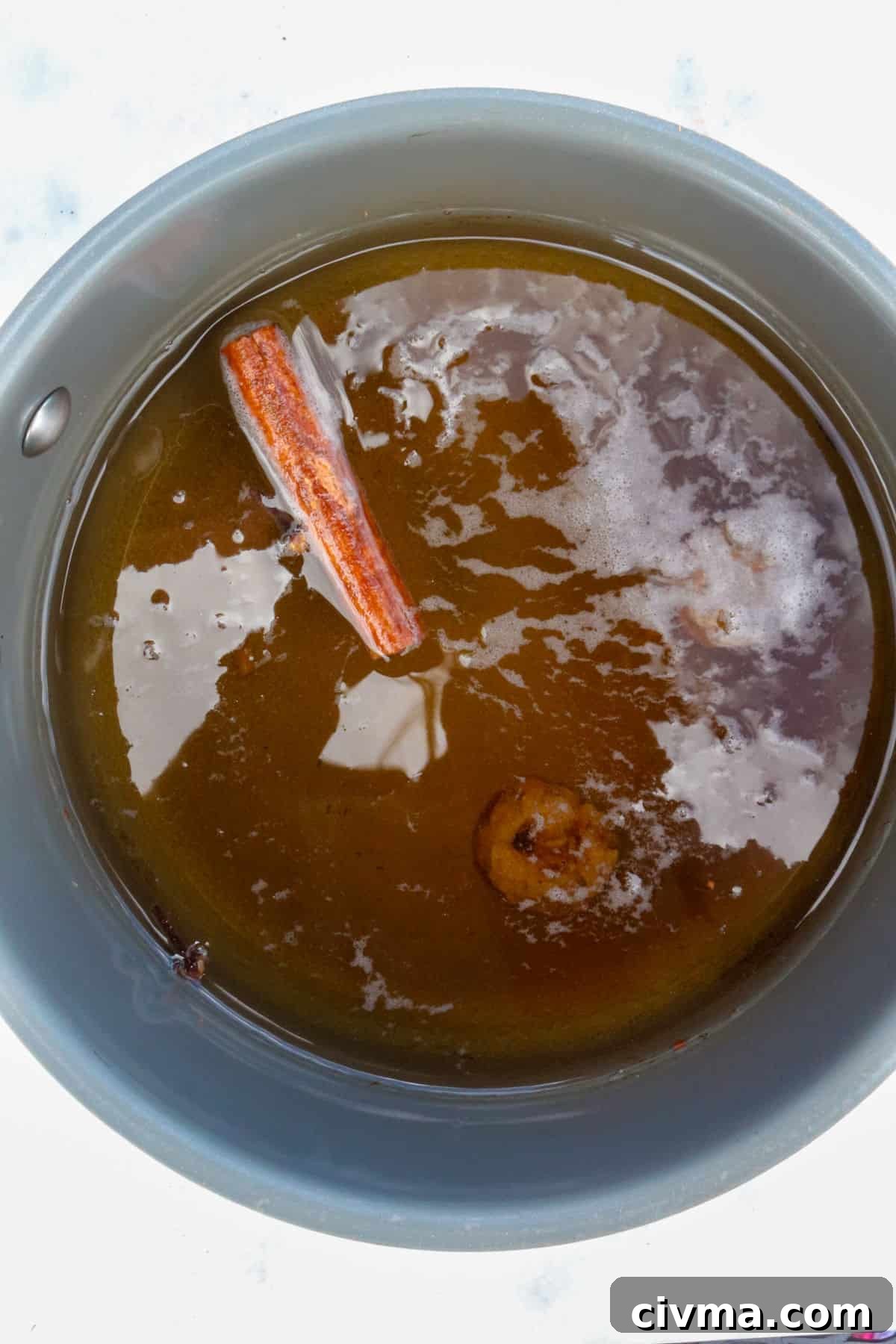 Authentic Mexican Café de Olla Recipe 4 Small pot with water and simmering spices for cafe de olla