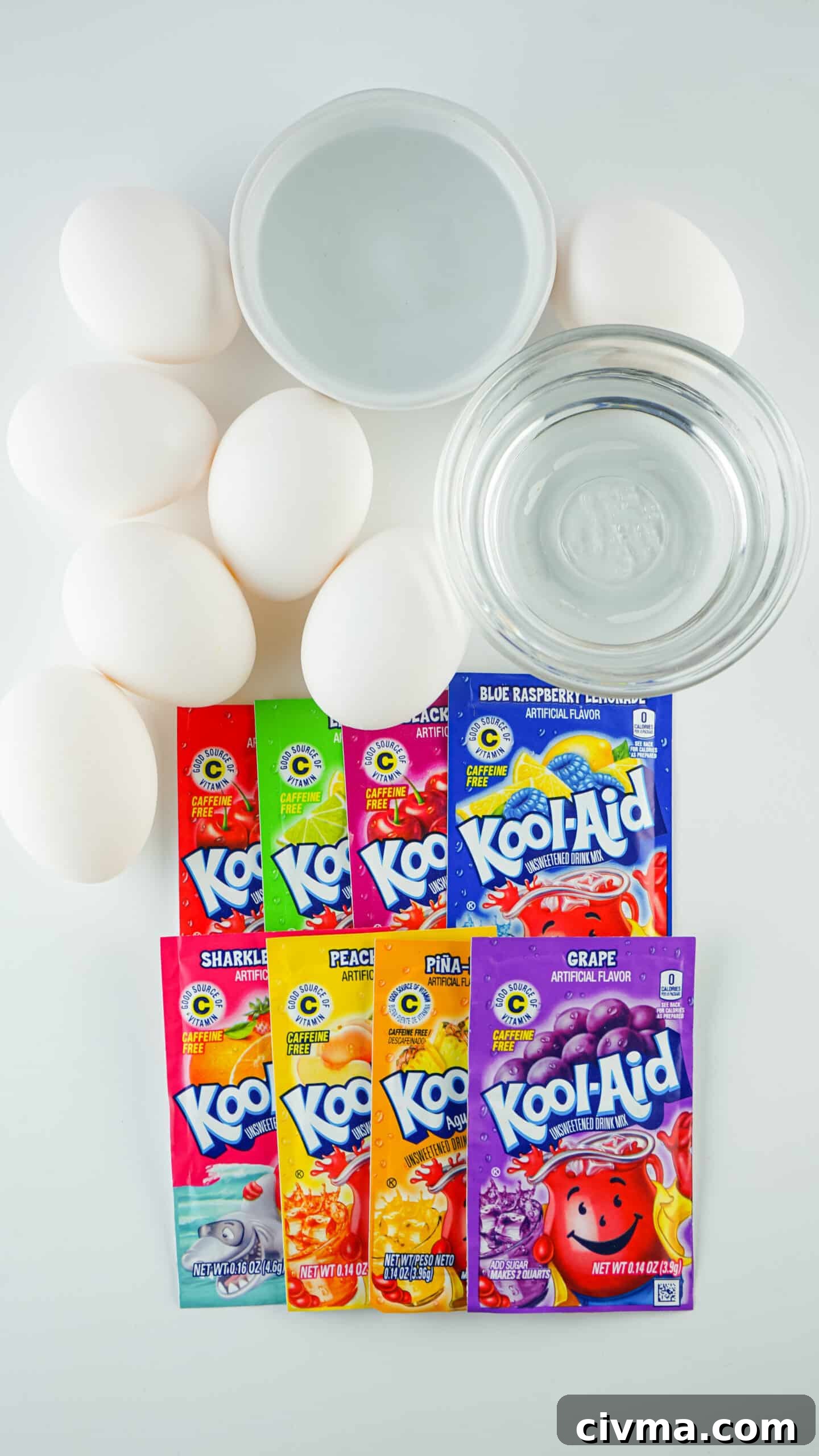 kool-aid dyed easter eggs ingredients on white table
