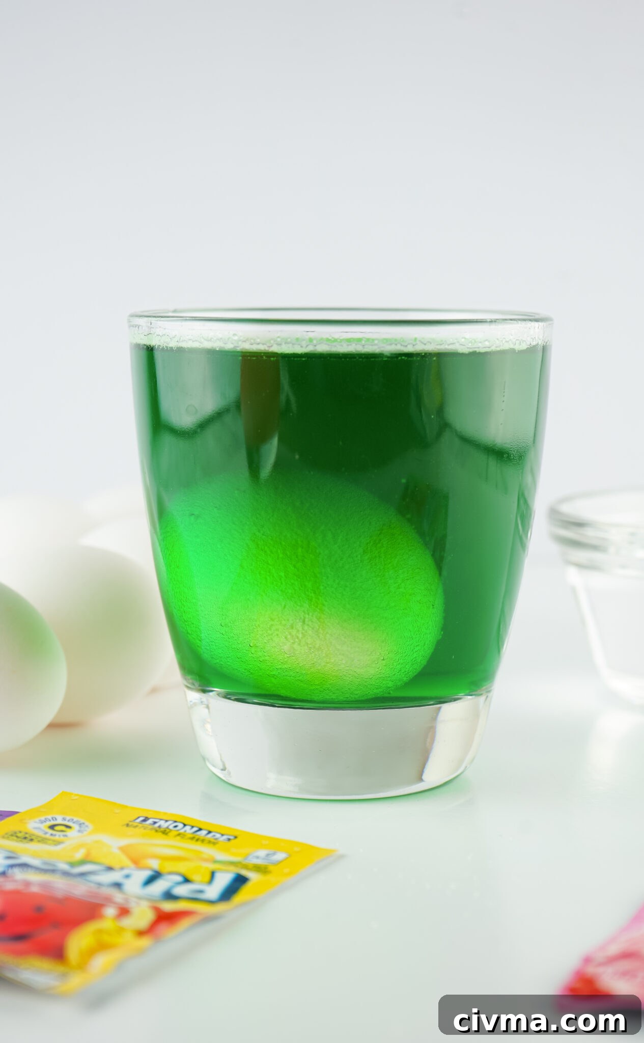 green kool-aid dyeing an egg