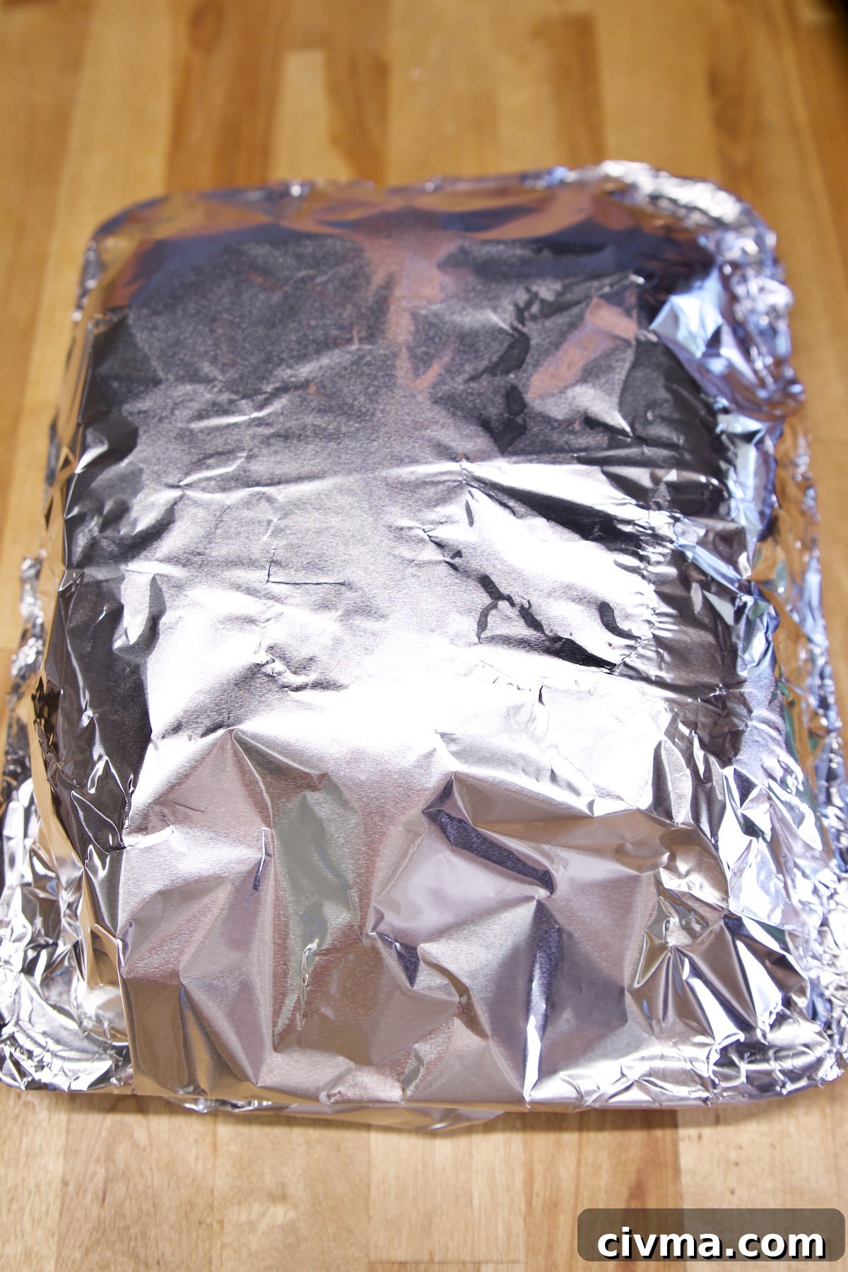 Cheesesteak Sliders recipe. Aluminum foil covered pan.
