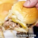 Pull Apart Philly Cheesesteak Sliders 2 Philly Cheesesteak Slider held in hand.