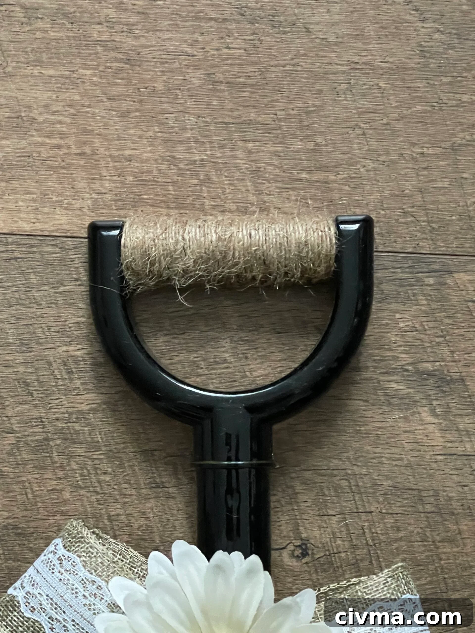 Twine-wrapped handle on a rustic farmhouse door wreath