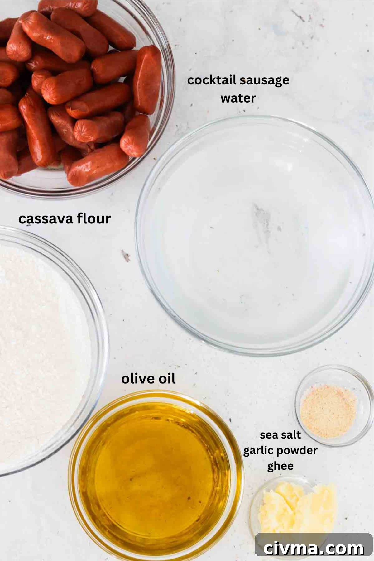 Mini sausages, cassava flour, water, oil, garlic and salt in small bowls.