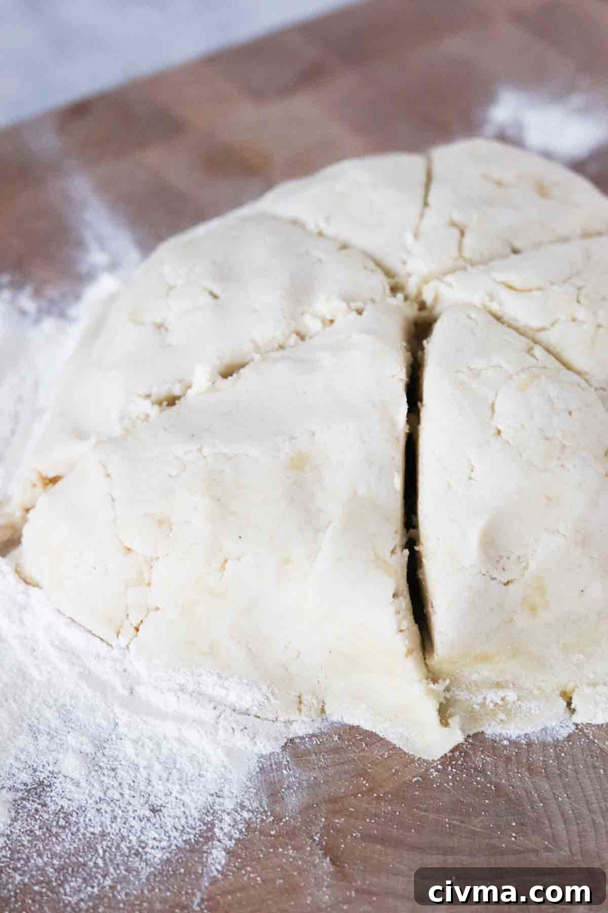 Pizza dough ball cut into fifths.
