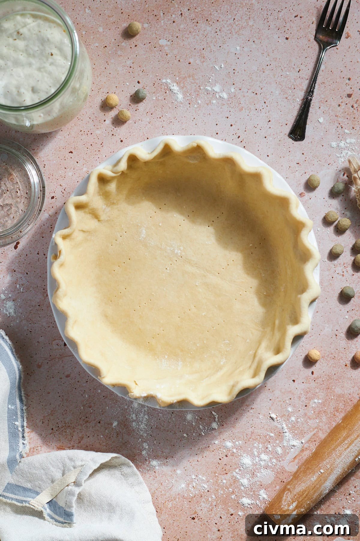 Sourdough Discard Pie Crust in a pie pan. 