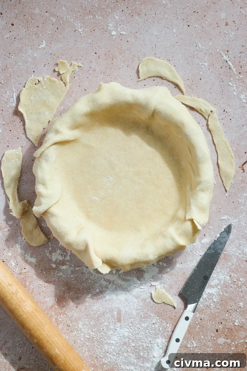 Sourdough Discard Pie Crust with the edges trimmed.