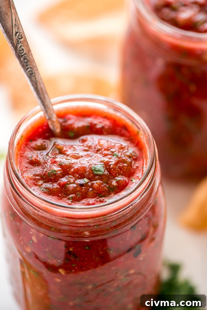 Homemade salsa recipe with roasted tomatoes and jalapenos.