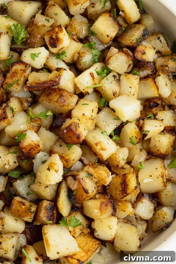 Closeup view of southern fried potatoes in a large bowl