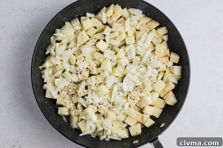 Potatoes and onions in large skillet