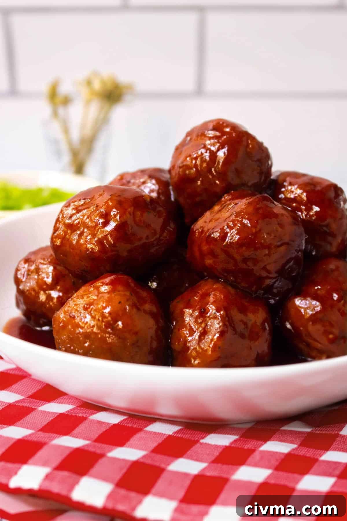17 Flavor-Packed Recipes with Frozen Meatballs 2 Grape jelly meatballs in a bowl