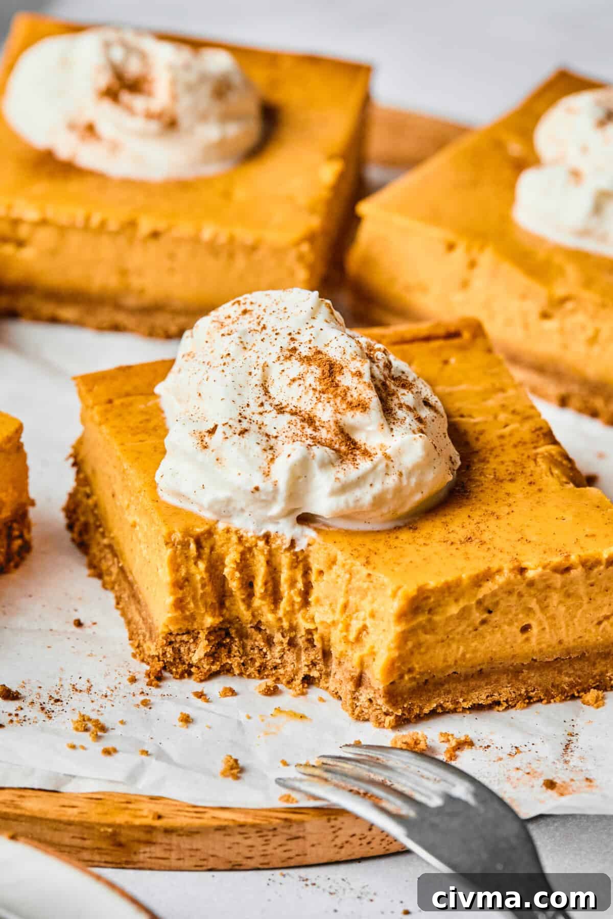 protein pumpkin pie bars with a bite taken out of one