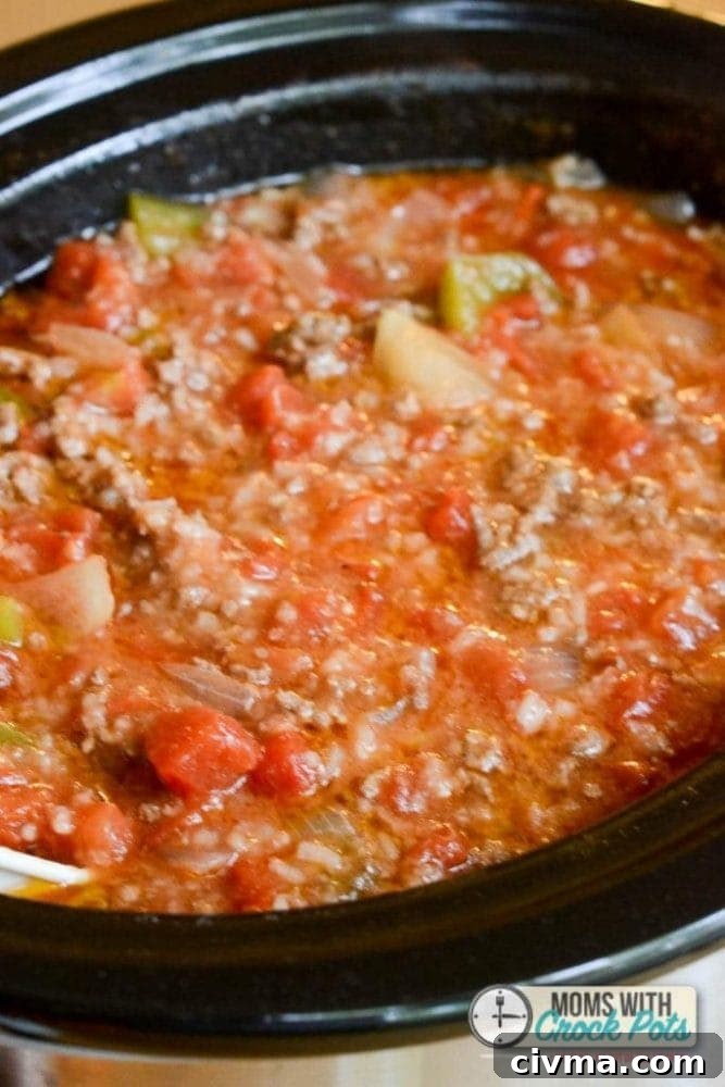 Slow Cooker Stuffed Pepper Soup Recipe 4 A quick and easy slow cooker dinner! Whip up a batch of this Crockpot Stuffed Pepper Soup Recipe!