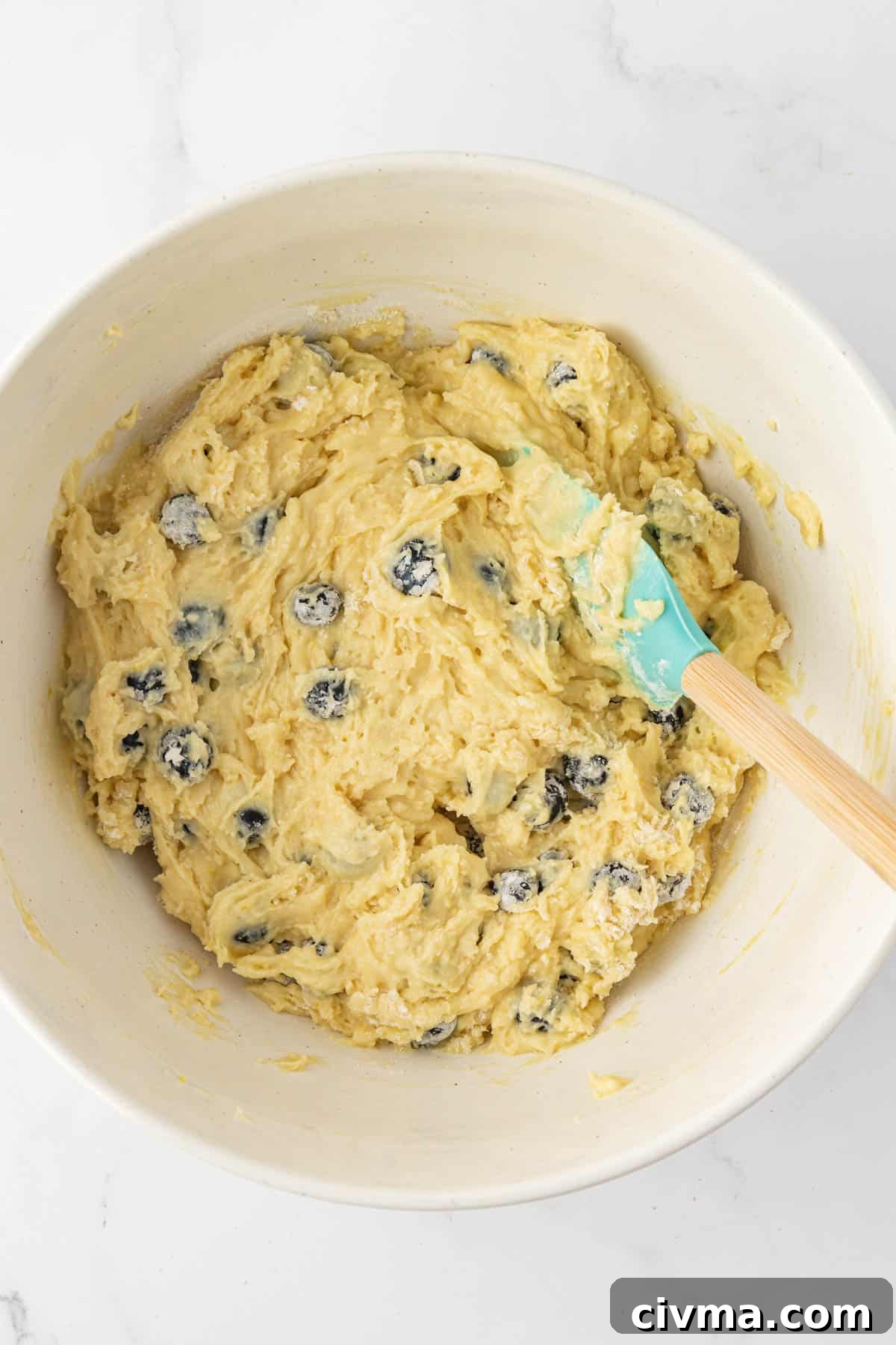 Moist Sour Cream Blueberry Muffins Recipe 11 blueberries folded into the muffin batter